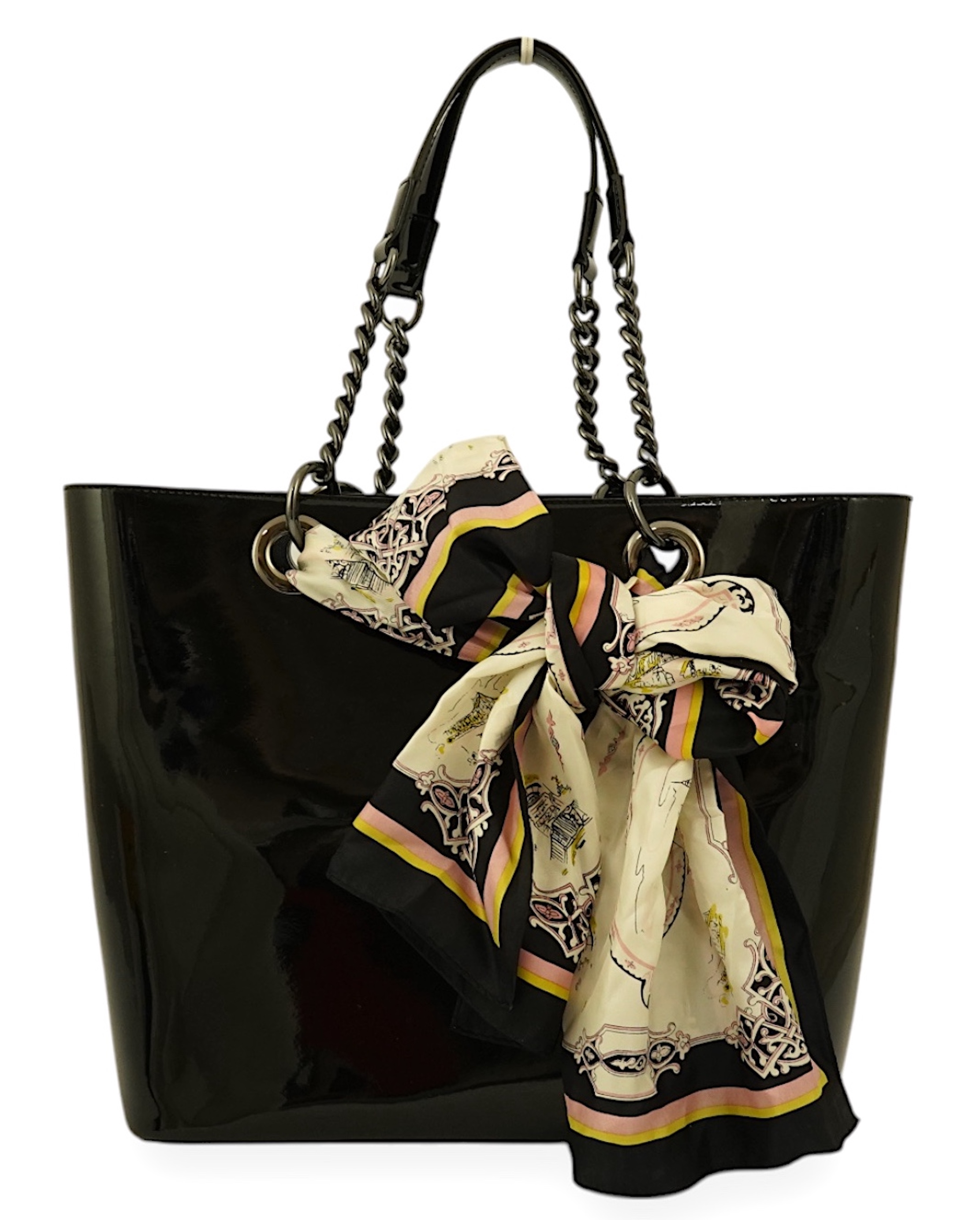 A DKNY black patient leather tote with scarf detail.